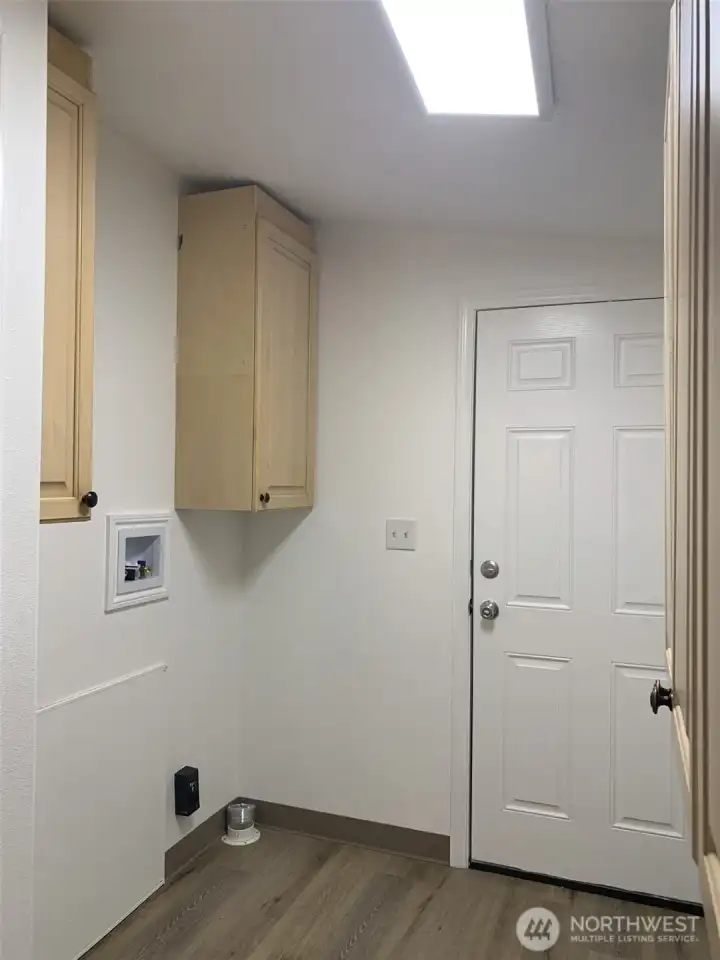 You will love the extra storage in the utility room that is convienently located off the kitchen and has access to the backyard and a small covered deck.