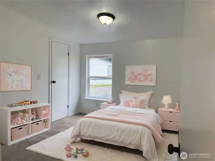 Virtually staged view of the second bedroom.