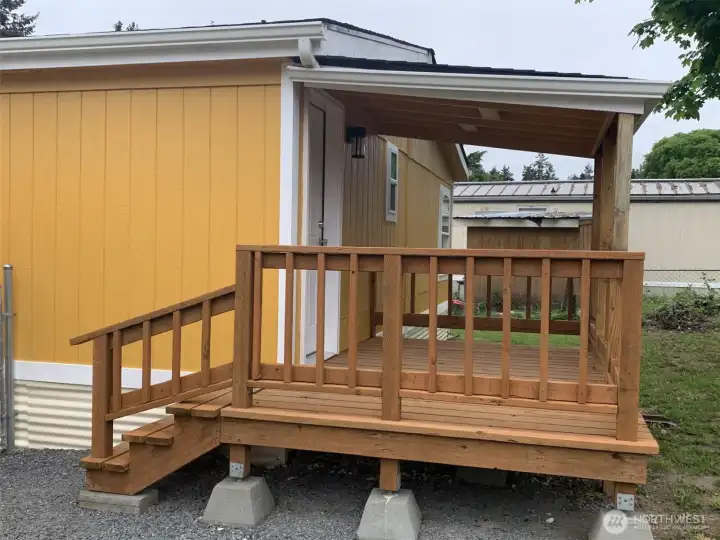 Covered back deck and entrance.