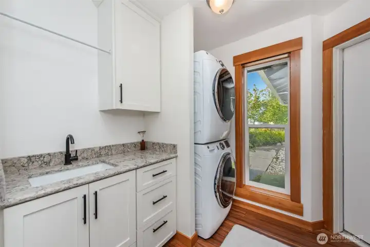 remodeled laundry center with sink