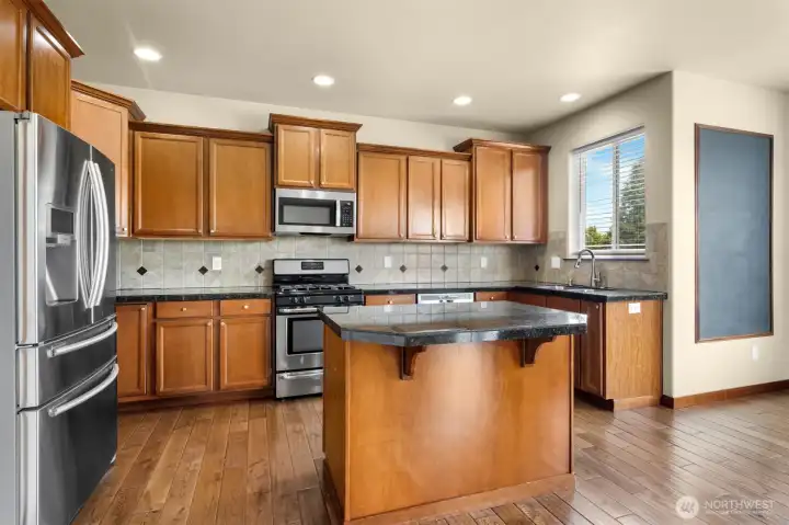 Plenty of counter space for all your meal prepping ideas, including your very own chalkboard to write down your reminders