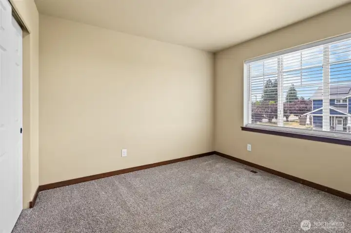 Bedroom 2 with 2 inch mini blinds allow for privacy throughout the house