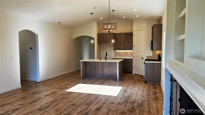 Great room concept, warm neutral colors throughout.