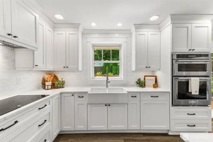 farmhouse sink overlooking the backyard, Jenn-aire Induction cooktop