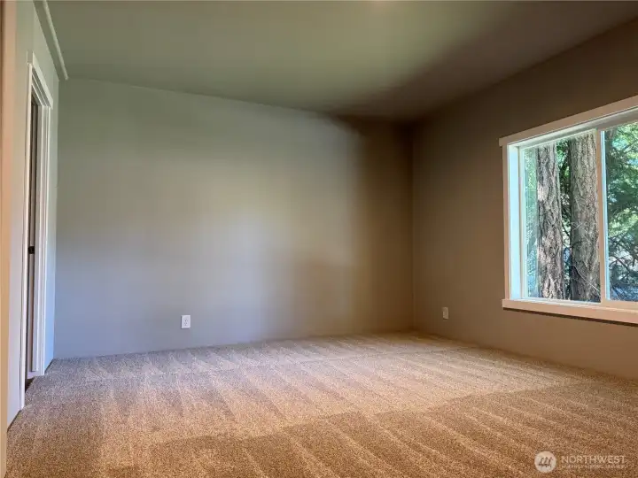 Spacious primary bedroom.
