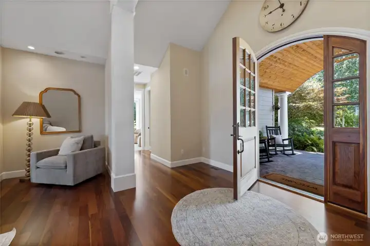Main entryway with gleaming hardwood floors.