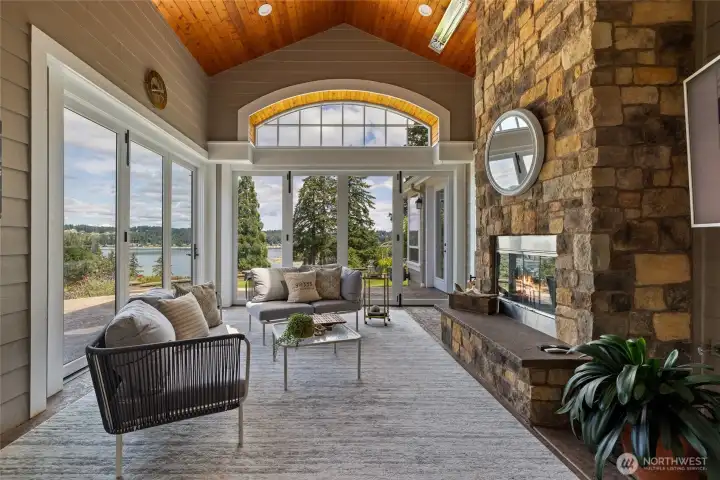 Sunroom was recently enclosed, to enjoy Puget Sound views regardless of the weather.