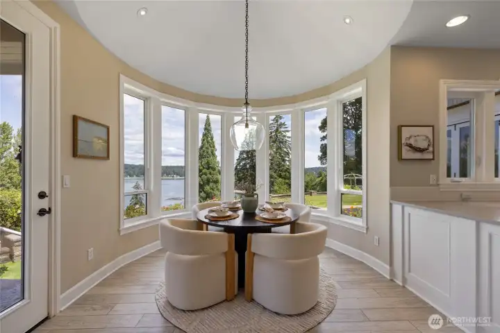 The kitchen dining room with scenic water view.