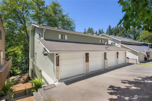 4 garage parking spaces, plus 8 tandem uncovered spaces. Well maintained property with many updates.