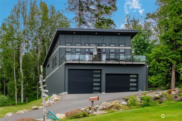 Sits high above prestigious Whitehorn Way and designed to maximize the view over Birch Bay.
