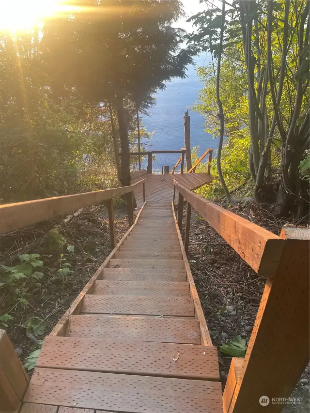 Deeded community beach access staircase with miles of shoreline to explore.