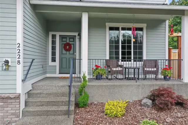 Well-sized front porch gives you the space to be out and social with neighbors & folks at work or play on the low-trafficked street.