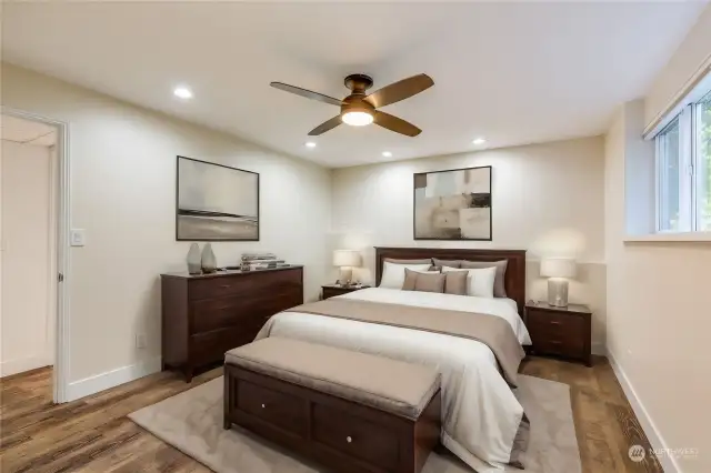 Downstairs bedroom with bathroom and walk-in closet.