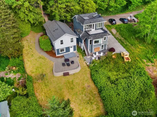 Set on a generous lot nestled into the hillside, this home offers privacy, charm, and space to roam.