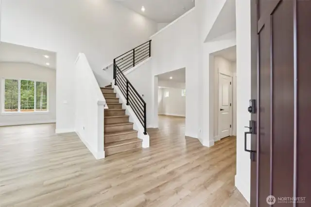 LVP flooring on main level, stair, and upper hallway. Stunning!