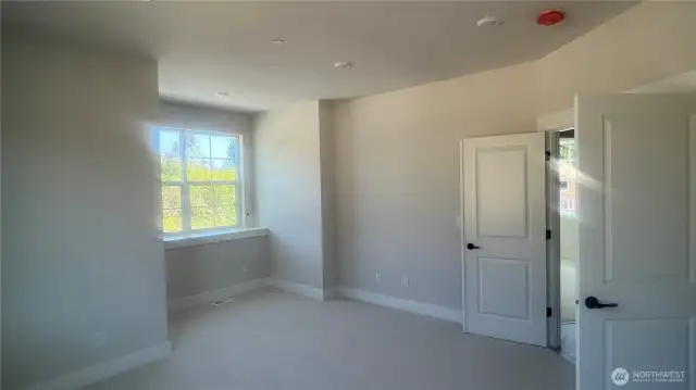 Another angle of the bonus room showing double doors