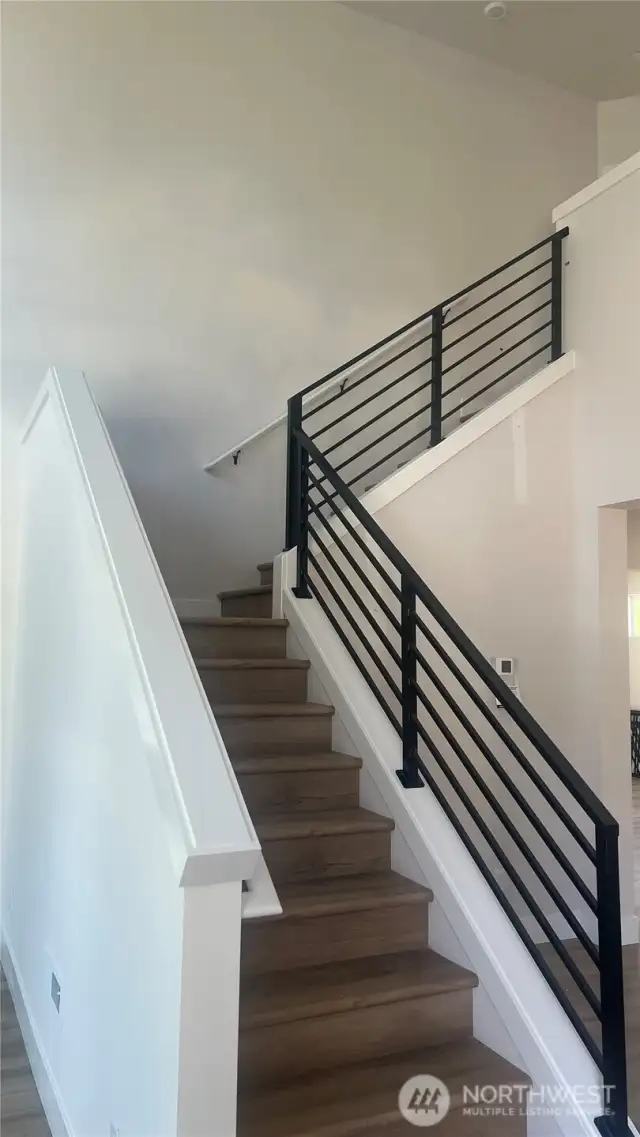 LVP flooring on main level, stair, and upper hallway. Stunning!