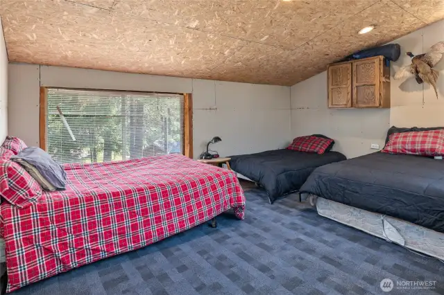 Upstairs/loft area of the Pool Hall has extra sleeping space.