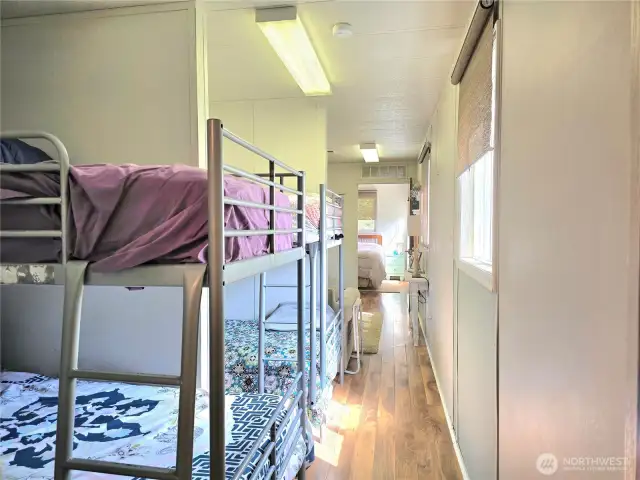Keep the double bunk beds or add a kitchen.