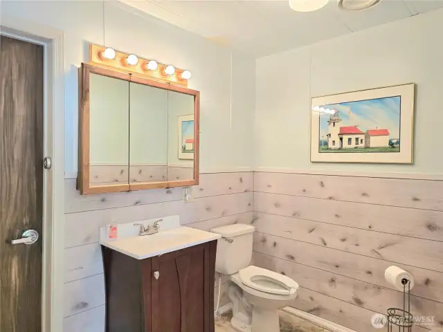 Half bath in bunk house with room to expand.