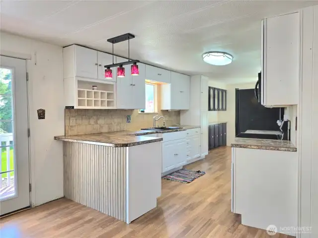 2 stools will fit right in that space.