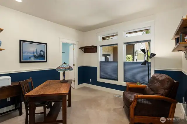 Main floor office with attached 3/4 bath.
