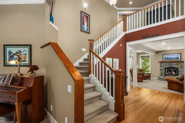 Grand 2-story foyer with beautiful hardwoods.