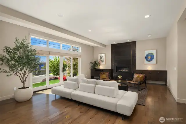 We love this custom metal fireplace.  It is a beautiful artisan statement.  Wonderful french doors let you enjoy Kirkland's mosst beloved and friendly street.