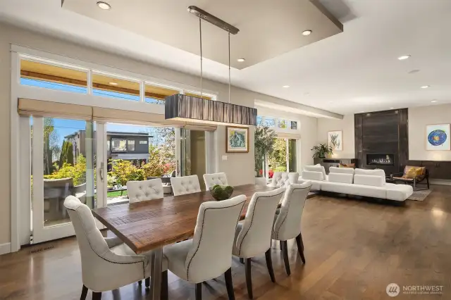 This generous dining area of the great room is perfect for both formal and informal dining.  The built in bar and doors to the front patio make entertaining a breeze!