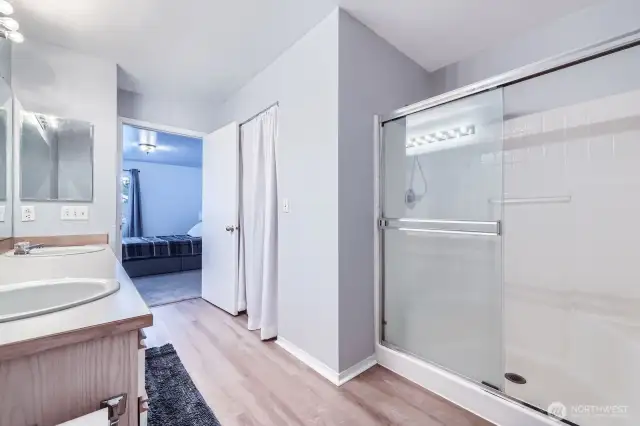 Walk-in Shower with Glass Doors, Shower Seating & Rain Showerhead