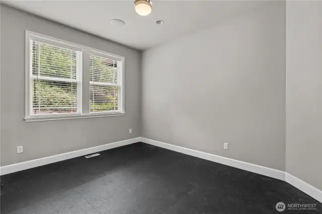 The spacious office is located just off the entry