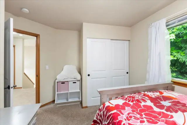 Bedroom # 2 with greenbelt views and brand new carpet