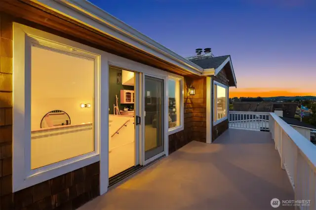 Your private retreat comes with a cozy sitting area, coffee bar, and jaw-dropping water views—morning lattes and evening sunsets never looked so good.