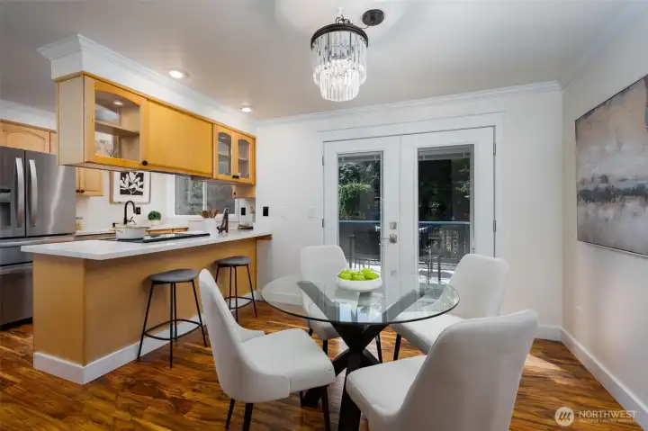 Gorgeous floors continue throughout the kitchen and dining space.