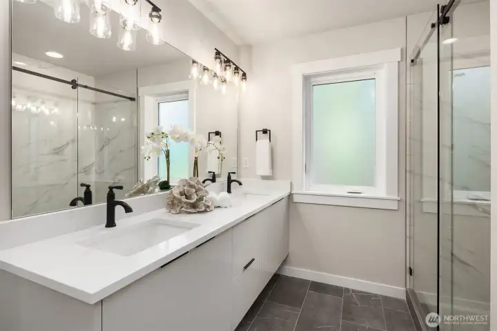 Luxurious en-suite bath in the primary suite.