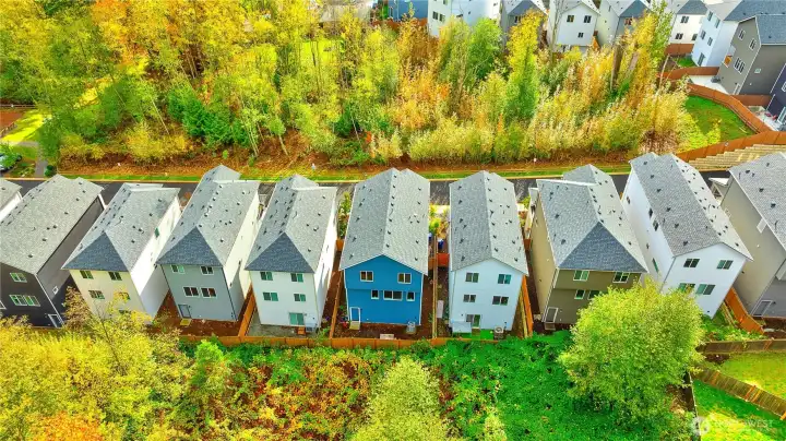 A home surrounded by greenbelts in the front and back, offering exceptional privacy.