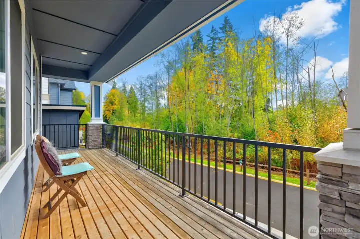 Spacious front balcony overlooking the greenbelt.