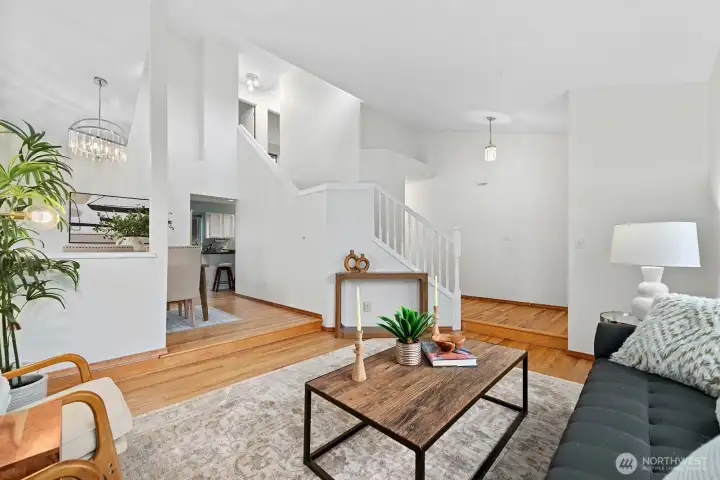 Living room looking towards the entry and dining room.