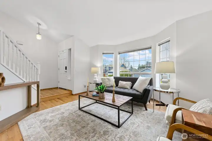 View from the dining room to the living room and entry.