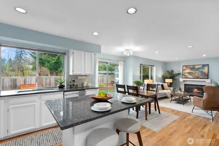 Kitchen is open to the family room and overlooks the rear yard.