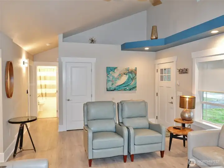 Living Room and Entry. Hallway leads to the bedrooms and bathrooms.