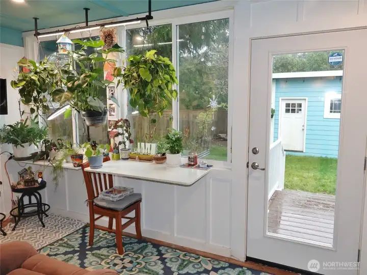 Lots of windows line this Enclosed Rear Deck.