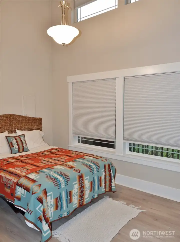 Guest Bedroom w/ vaulted ceiling.