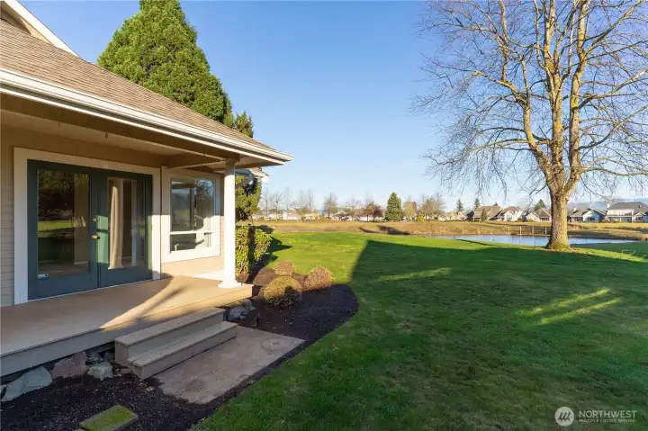 No need to mow, HOA covers that, you grab your favorite beverage or book and enjoy the scenary.