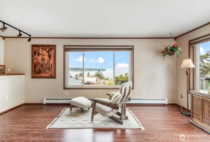 Living room with views of Olympic Mountains, Protection Island, Diamond Point and San Juans.