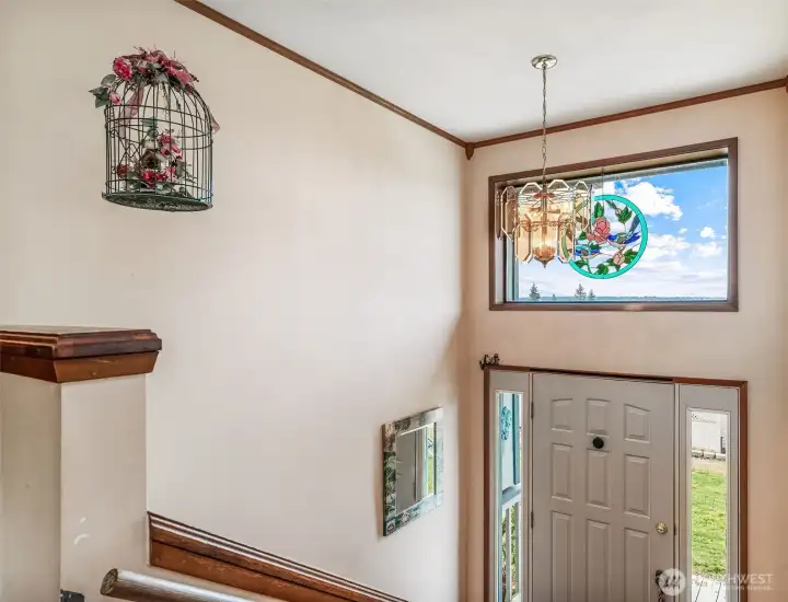 Lots of natural lighting fill the staircase to downstairs.