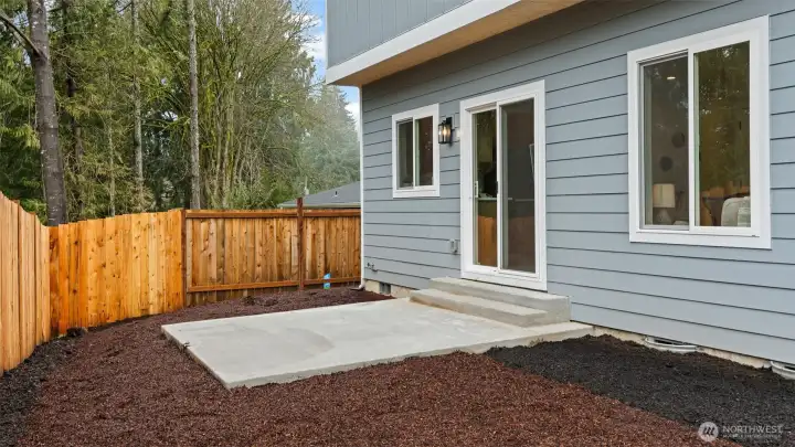 View of the “backyard”- could easily plant grass seed, etc.