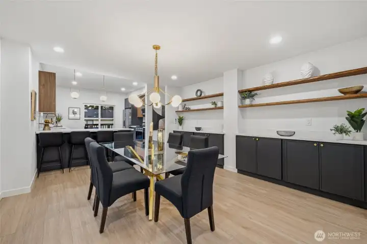 Dedicated dining area joining the kitchen and living areas.