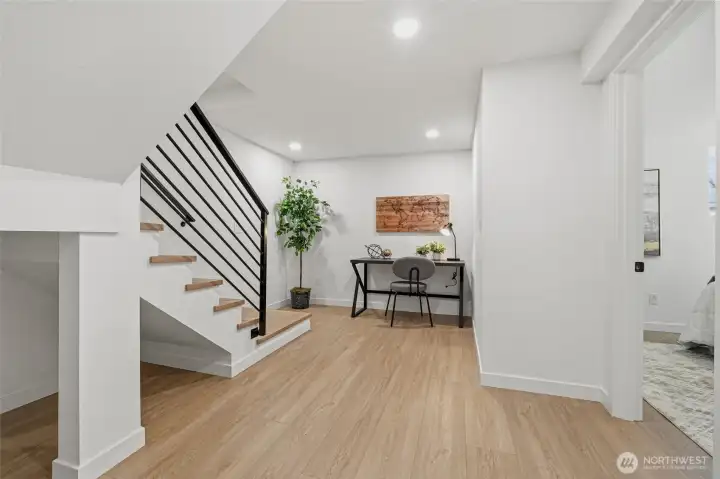 Lower level permitted ADU with office space.