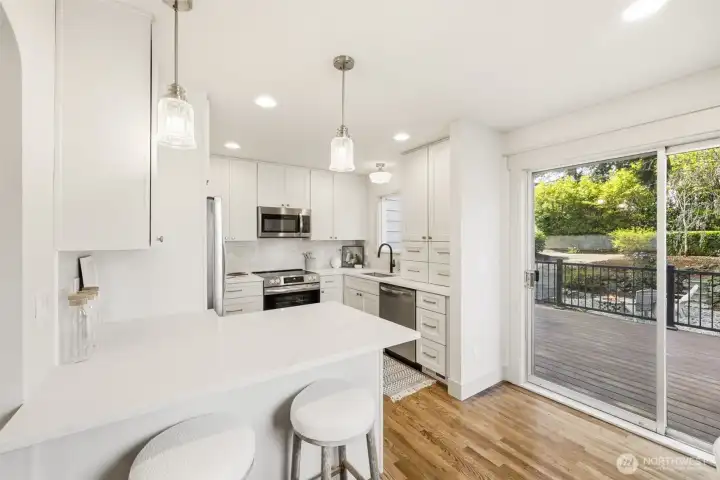 Quartz counters, stainless appliances, and a layout made for entertaining